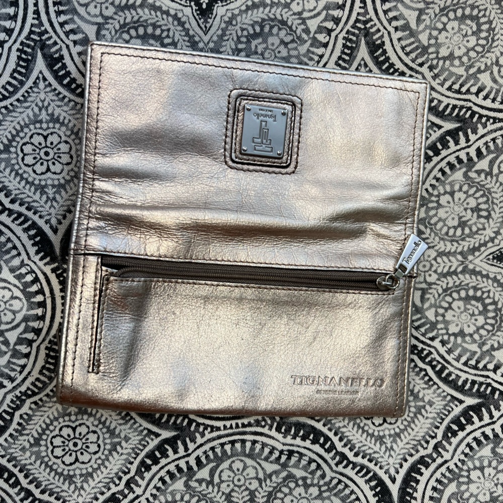 Silver leather Tignanello wallet with multi card slots-room for checkbook. EUC